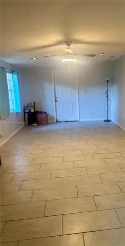 a view of a livingroom with furniture