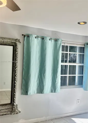 a view of front door with stairs