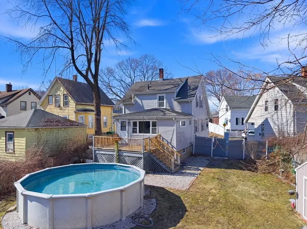 a front view of house with outdoor seating