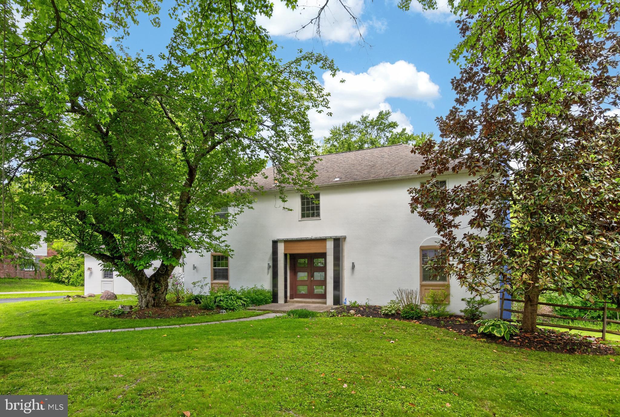 700 Campwoods Road Villanova, PA 19085 - Photo 76 of 77 a front view of a house with a garden