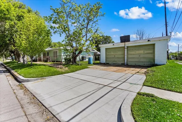 a view of a house with a garden