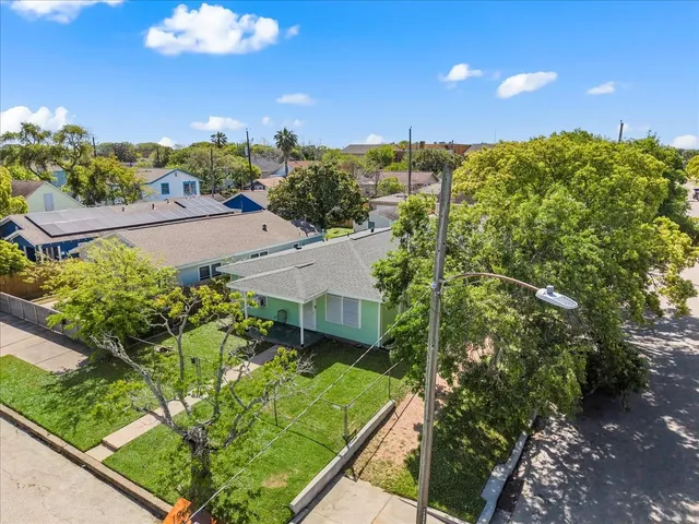 a view of a house with a garden