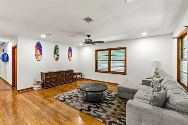 a living room with furniture or couch and a window