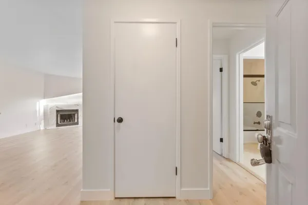 a view of a livingroom with wooden floor