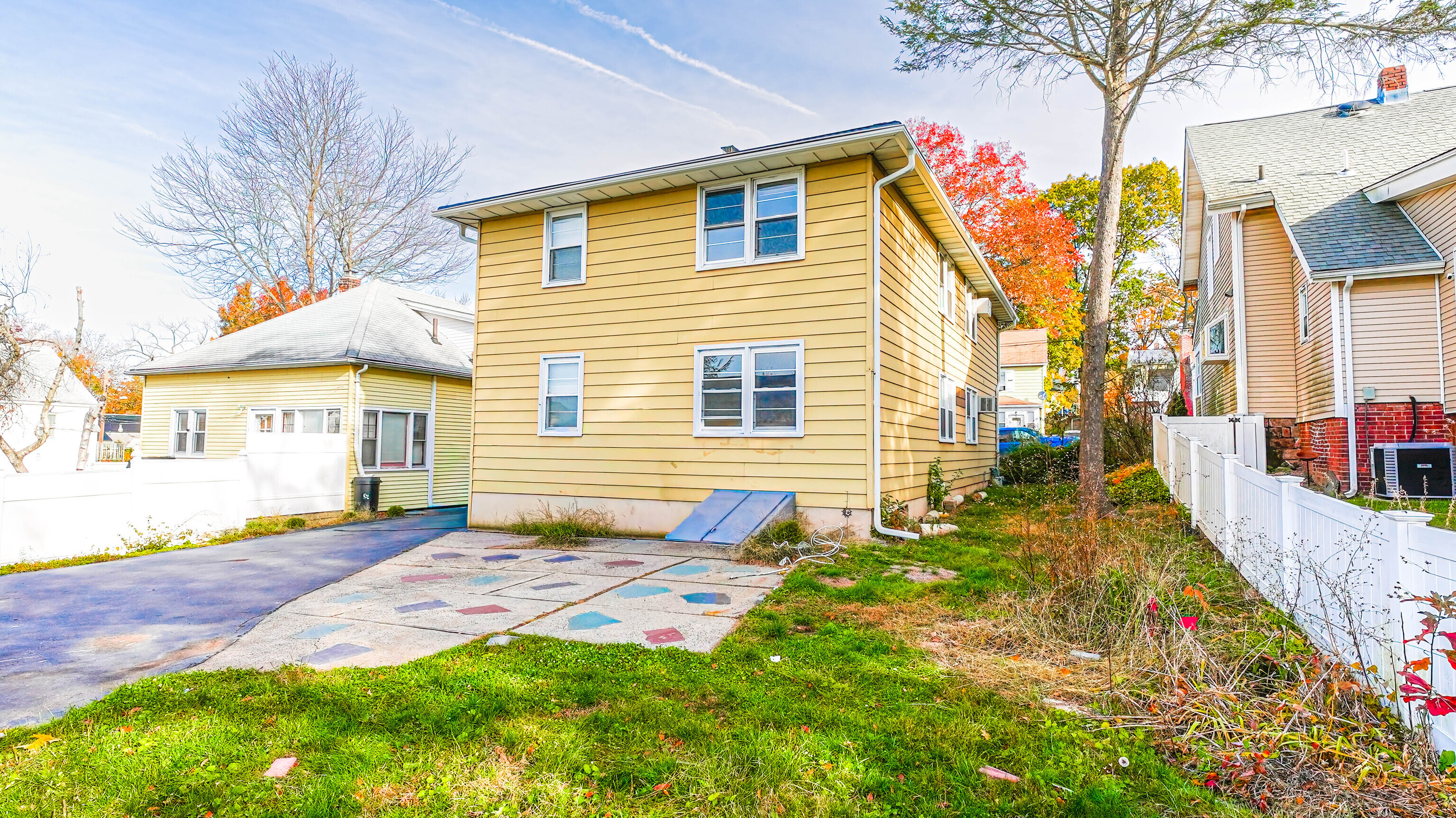 46 Millis Street, Unit 2 Hamden, CT 06514 - Photo 16 of 16 a view of a house with a yard