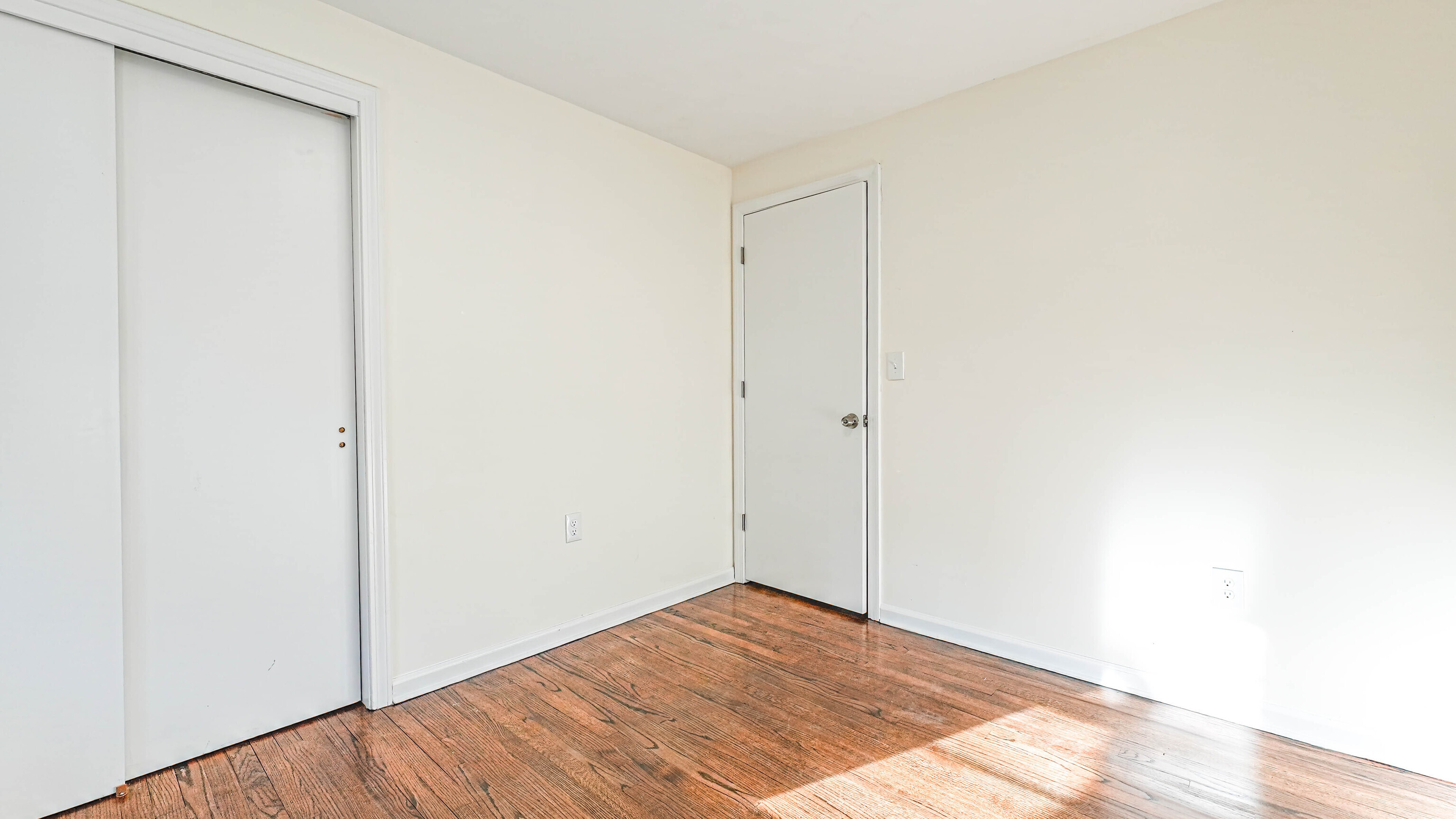 46 Millis Street, Unit 2 Hamden, CT 06514 - Photo 7 of 16 a view of a room with wooden floor