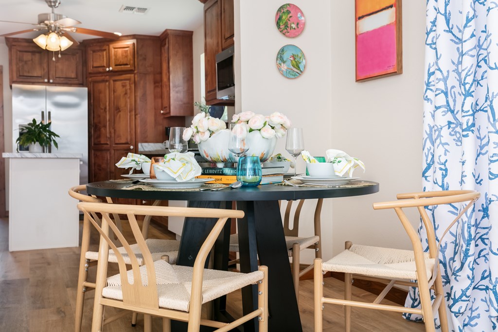 901 Bell Street Fredericksburg, TX 78624 - Photo 6 of 25 a view of a dining room with furniture and chandelier