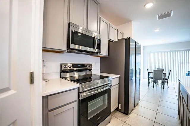 a bathroom with a sink toilet and a mirror