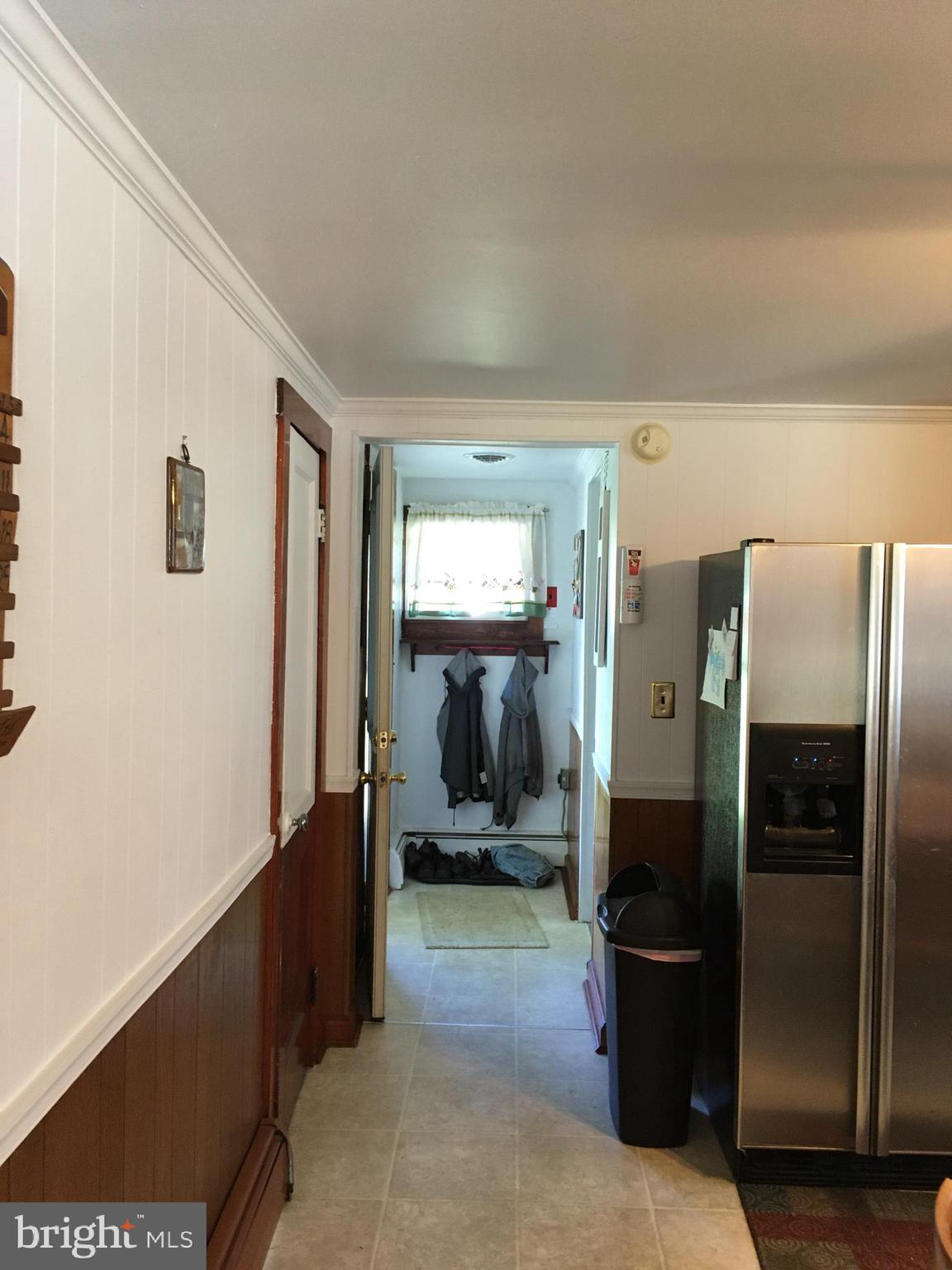 4849 Skinners Neck Road Rock Hall, MD 21661 - Photo 11 of 21 Kitchen leads to laundry room