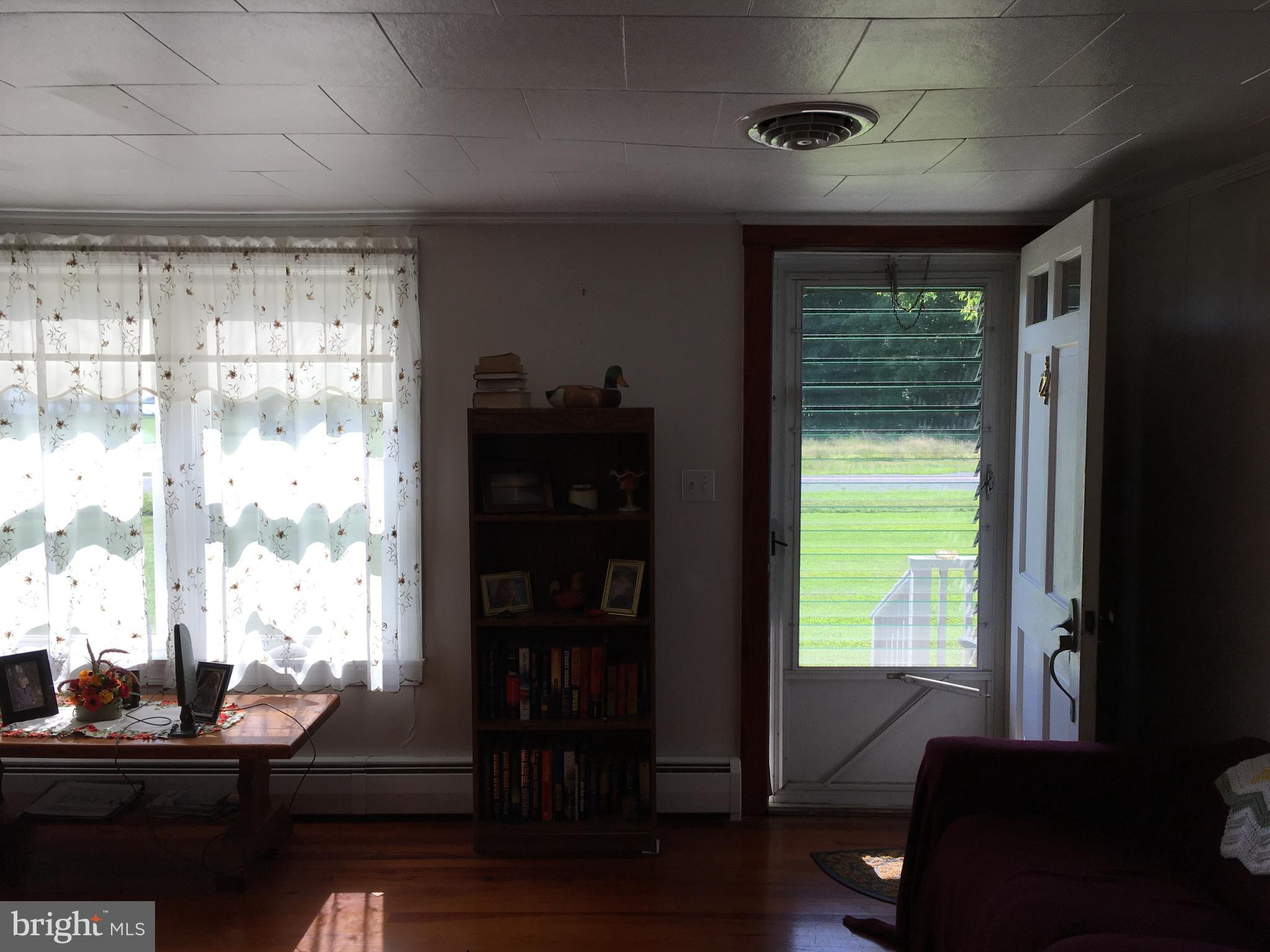 4849 Skinners Neck Road Rock Hall, MD 21661 - Photo 4 of 21 Entrance into living room