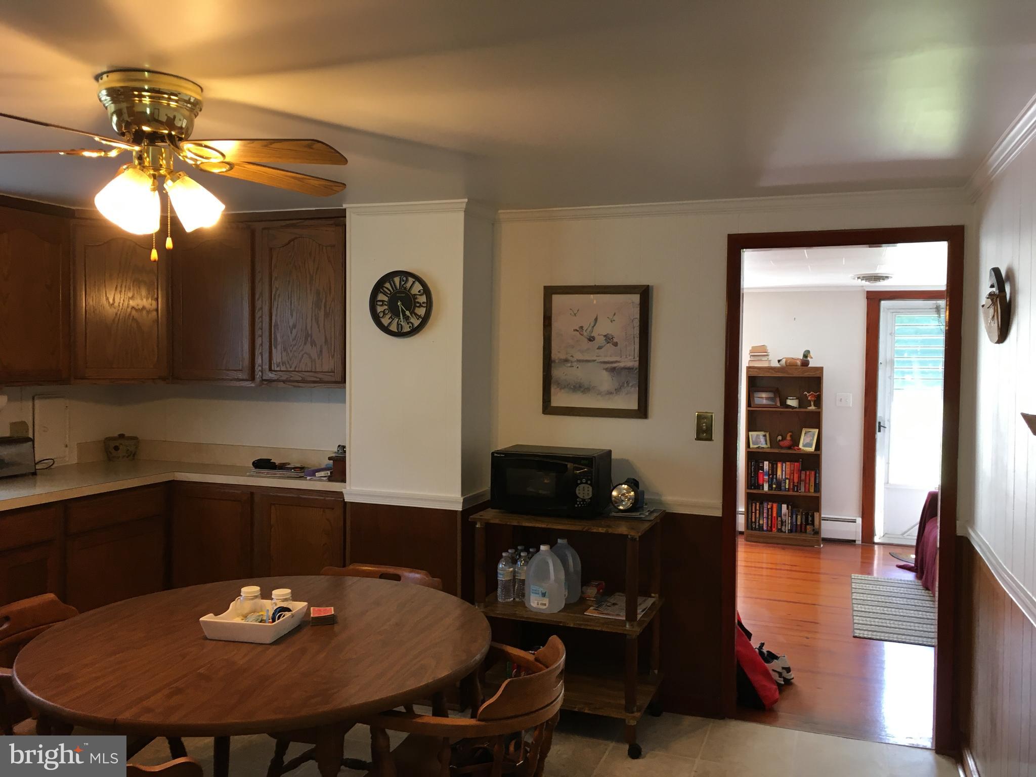 4849 Skinners Neck Road Rock Hall, MD 21661 - Photo 7 of 21 Kitchen looking into living room