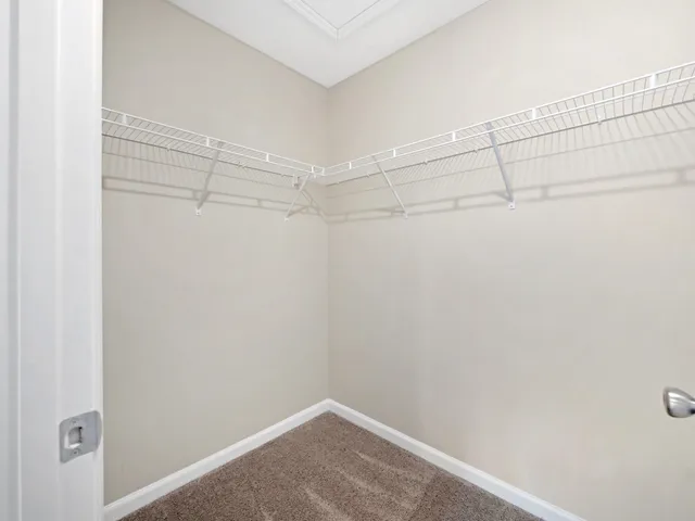 a view of a room with racks on the wall