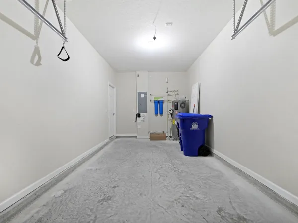 a view of a storage & utility room with wooden floor