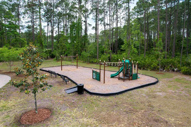 a view of a yard with furniture
