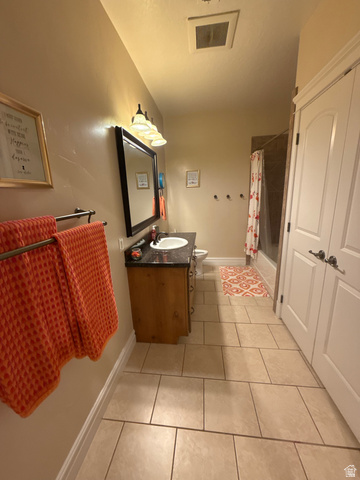 3145 South 500 West Vernal, UT 84078 - Photo 28 of 64 Bathroom with vanity, light tile patterned floors, and shower / tub combo