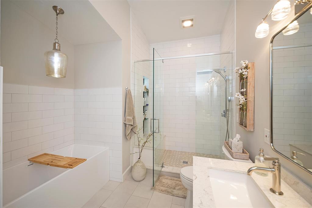 7810 Northwest 87th Avenue Tamarac, FL 33321 - Photo 13 of 21 a bathroom with a sink a toilet and shower