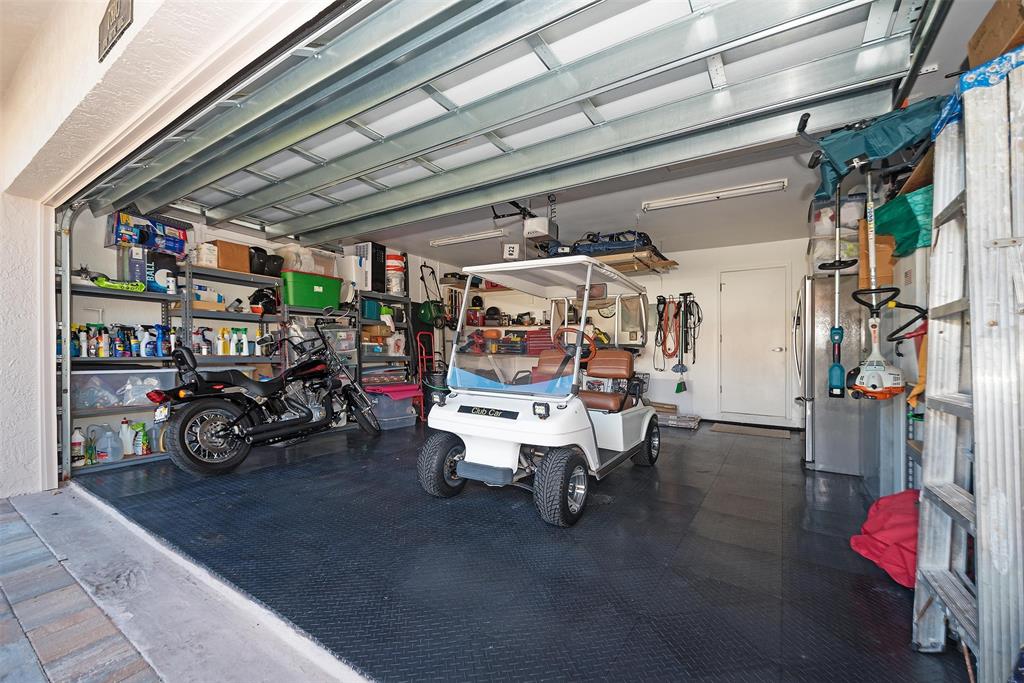7810 Northwest 87th Avenue Tamarac, FL 33321 - Photo 21 of 21 a view of a garage with a table and chairs