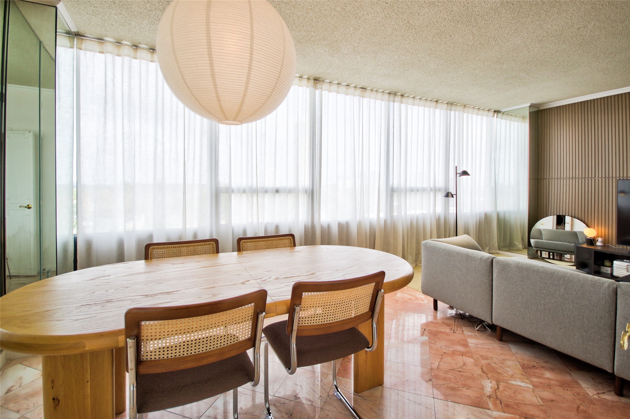 2701 Westheimer Road, Unit 7H Houston, TX 77098 - Photo 9 of 21 a view of a dining room with furniture and a window