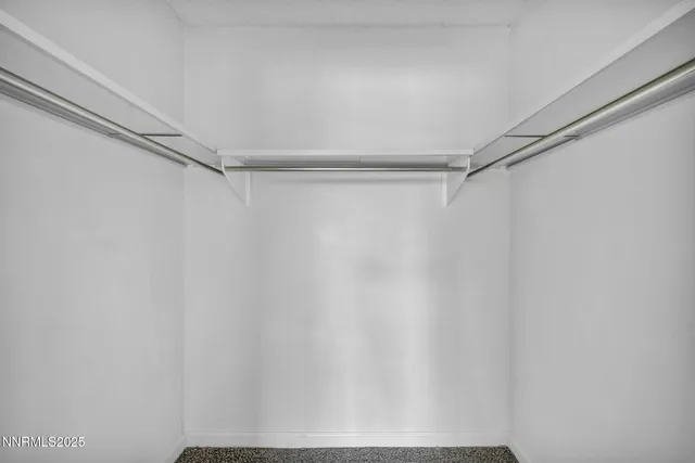 an aerial view of a house with yard swimming pool and outdoor seating