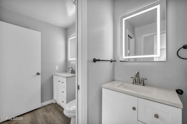 an aerial view of a house with outdoor space and pool seating