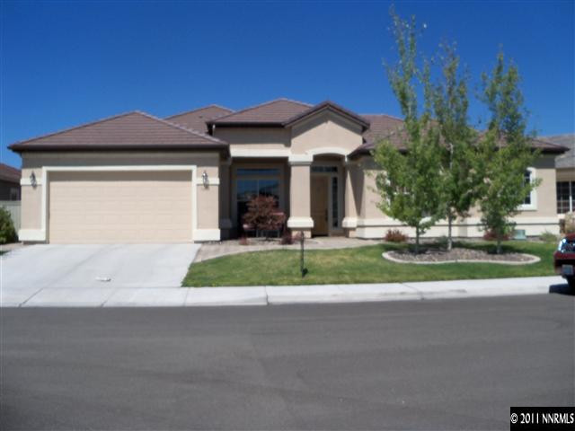 1635 Picket Court Reno, NV 89521 - Photo 1 of 1 a view of a house with a yard and plants