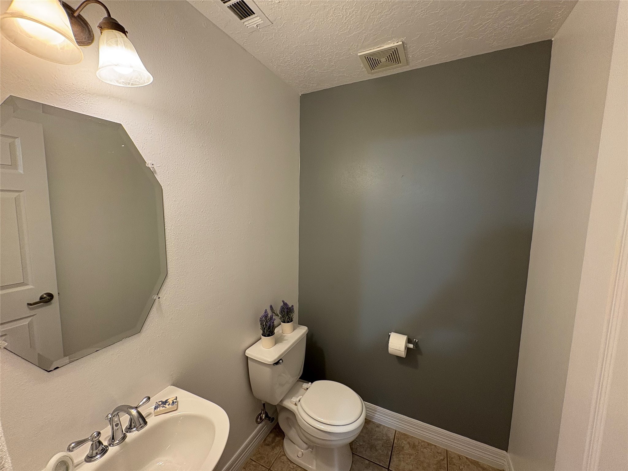 3710 Sherwood Lane, Unit 102 Houston, TX 77092 - Photo 19 of 27 Half Bathroom strategically located in the second floor.