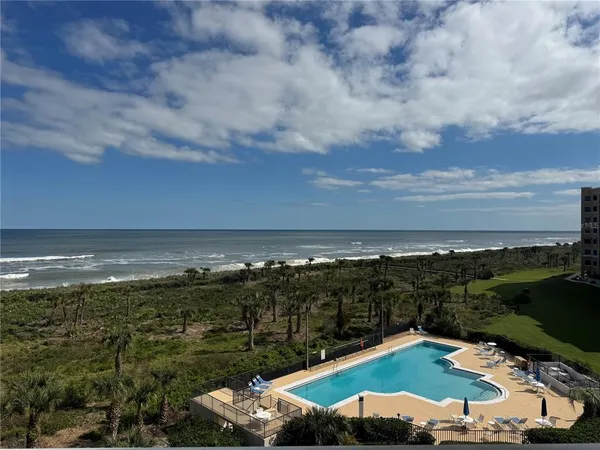 a view of a lake with a city
