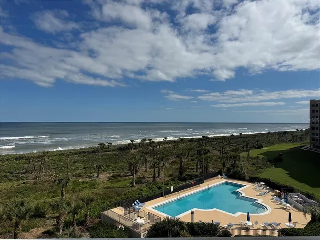 a view of a lake with a city
