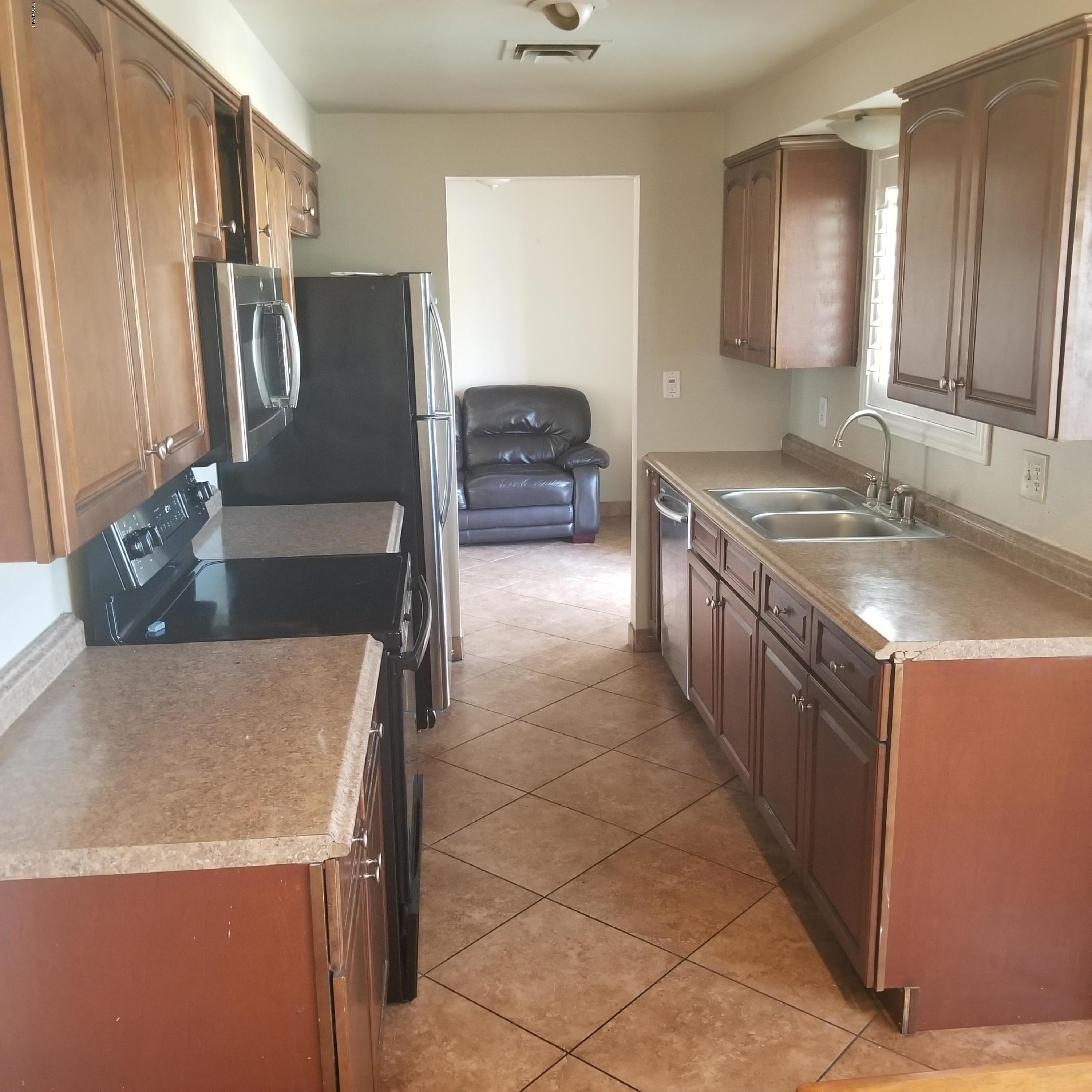 3740 West Griswold Road Phoenix, AZ 85051 - Photo 7 of 16 20200107_121244