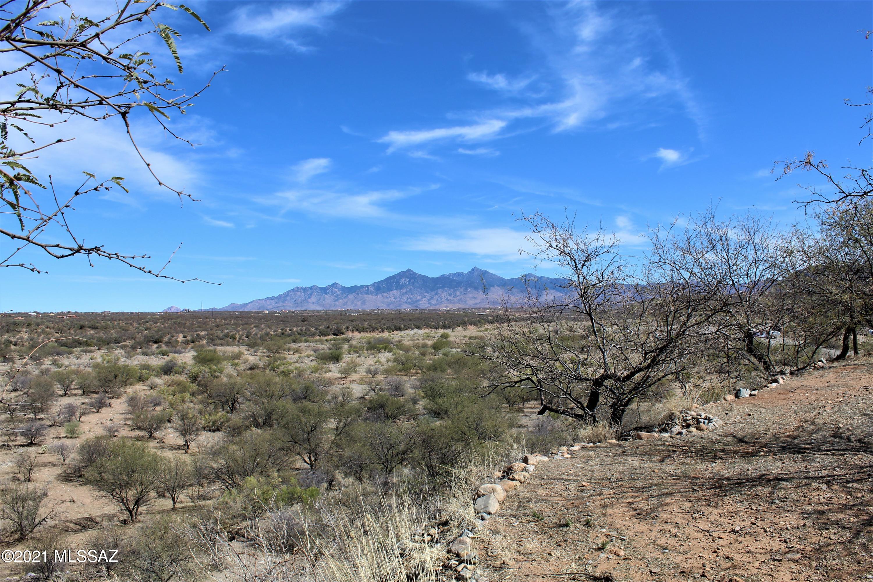 1704 Leary Court Rio Rico, AZ 85648 - Photo 14 of 37 a view of mountain with sunset in background