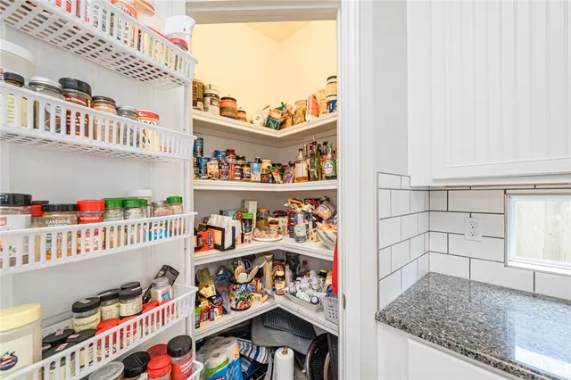 a view of a storage and utility room