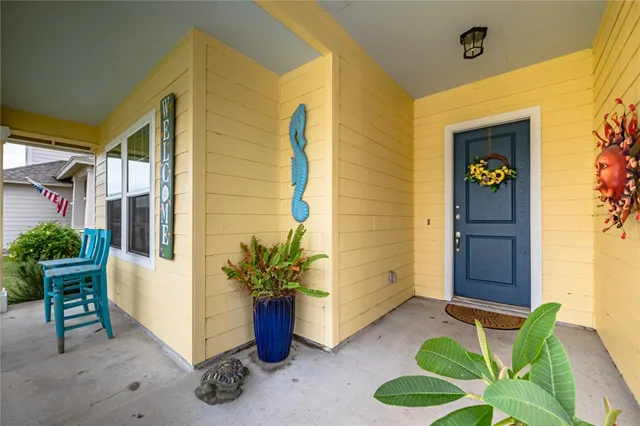 a view of a entryway door front of house