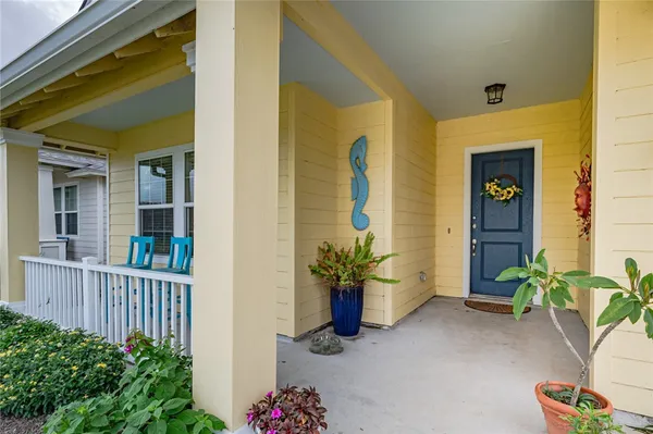 a view of a balcony with an entryway