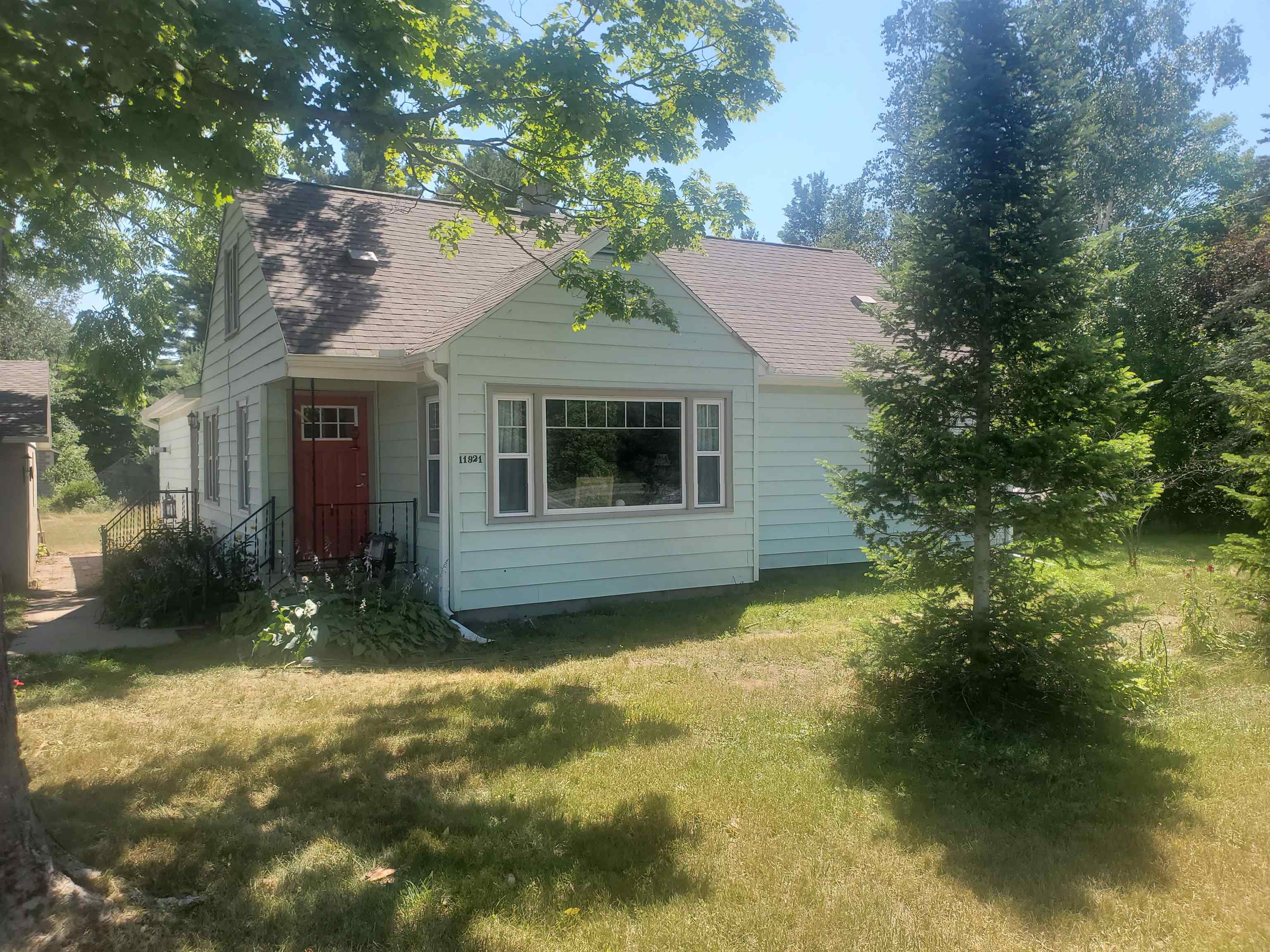 11921 Homestead Road Beulah, MI 49617 - Photo 1 of 57 1902757.JPG