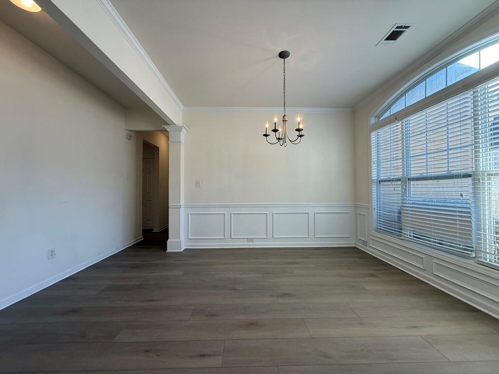 4273 Winslow Hill Court Suwanee, GA 30024 - Photo 5 of 34 a view of an empty room with a window