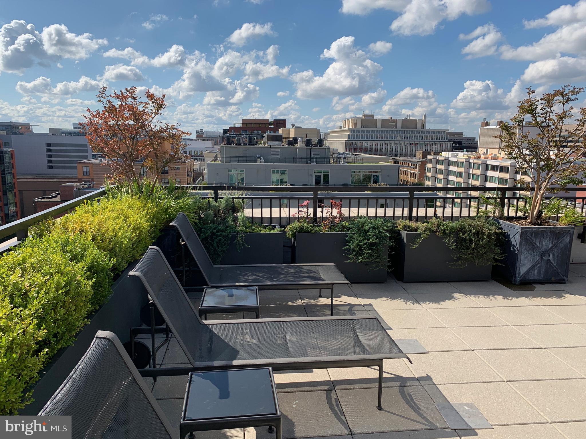 1011 M Street Northwest, Unit 702 Washington, DC 20001 - Photo 25 of 61 a view of a terrace with sitting area
