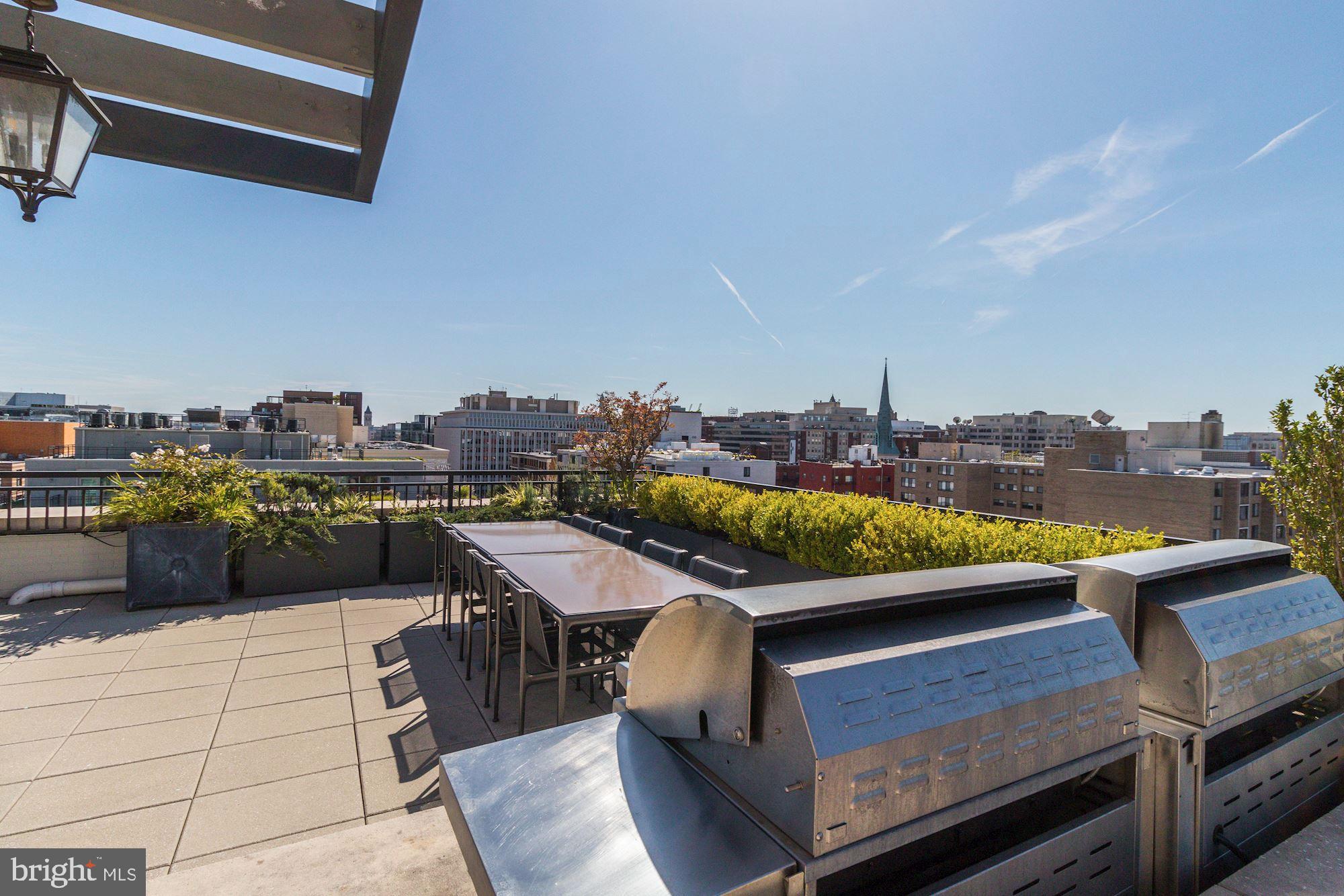 1011 M Street Northwest, Unit 702 Washington, DC 20001 - Photo 26 of 61 a view of a city from a terrace