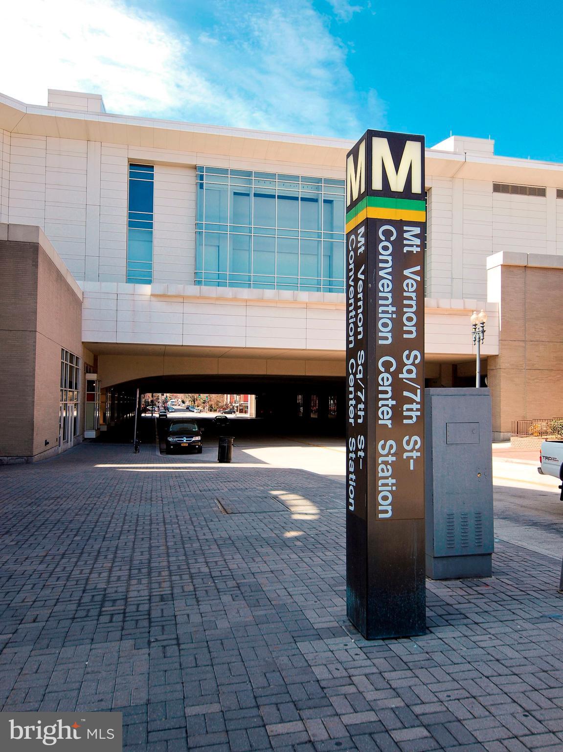 1011 M Street Northwest, Unit 702 Washington, DC 20001 - Photo 40 of 61 a front view of a building with parking area