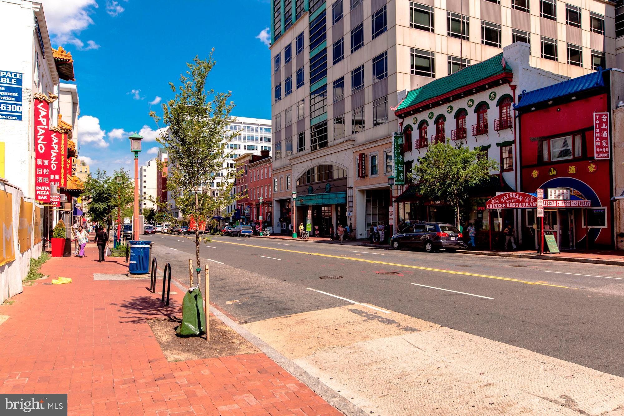 1011 M Street Northwest, Unit 702 Washington, DC 20001 - Photo 55 of 61 a view of a street with a building in the background