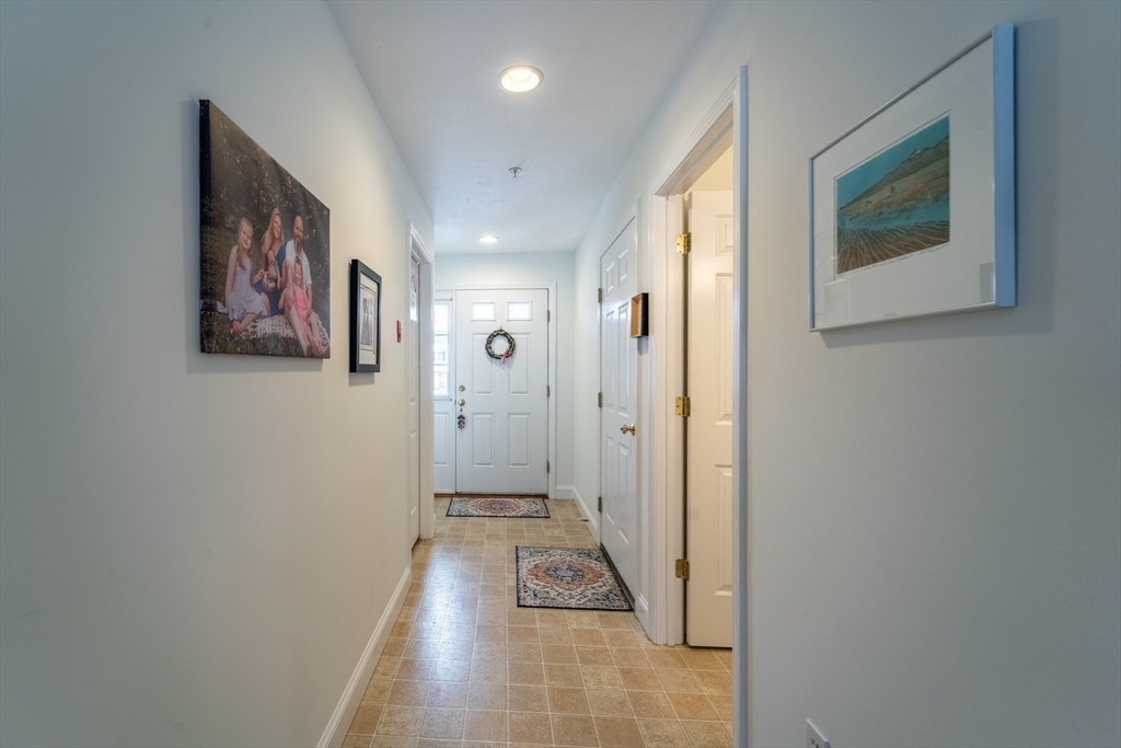 17 Village Way, Unit 17 Rutland, MA 01543 - Photo 11 of 33 a view of hallway with window and furniture