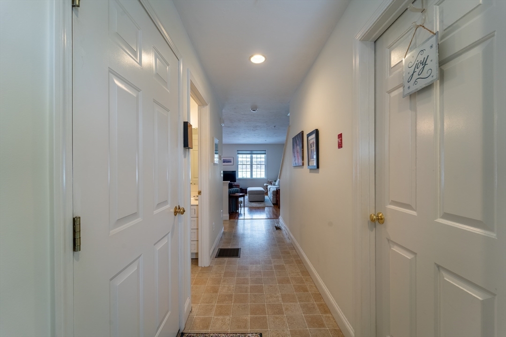 17 Village Way, Unit 17 Rutland, MA 01543 - Photo 12 of 33 a bathroom with a sink and mirror