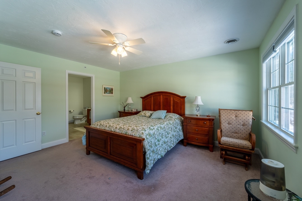 17 Village Way, Unit 17 Rutland, MA 01543 - Photo 18 of 33 a bedroom with a bed chair and window