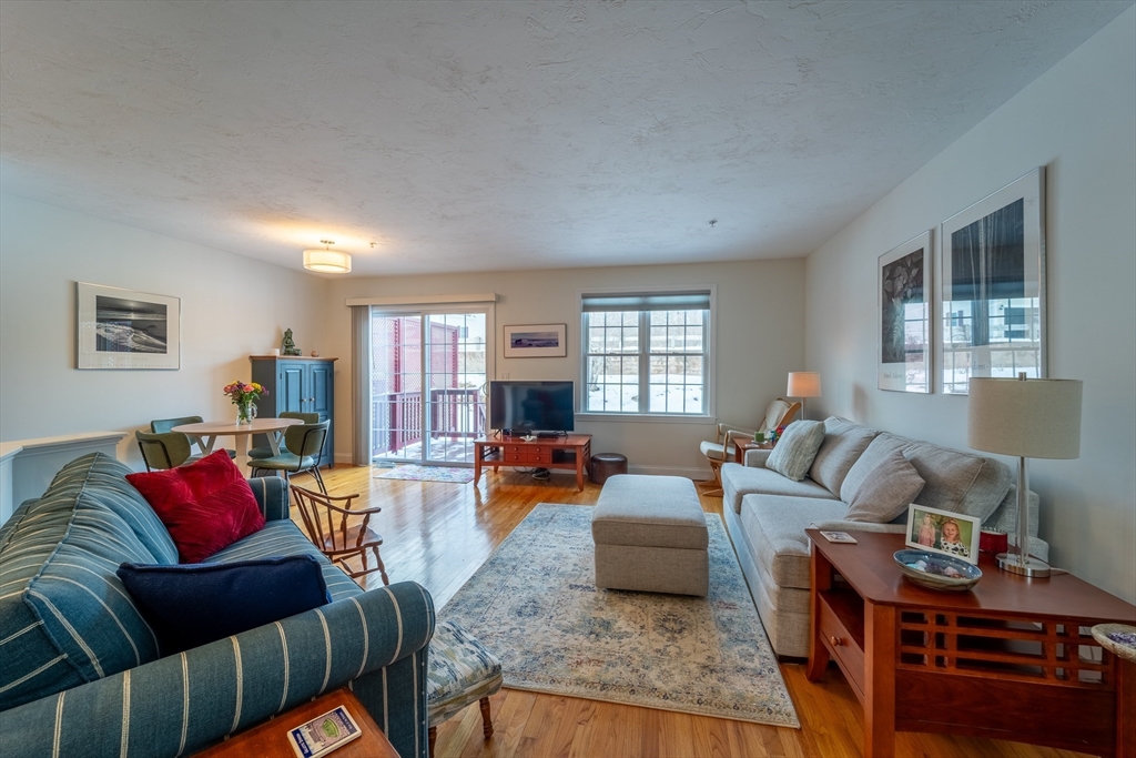 17 Village Way, Unit 17 Rutland, MA 01543 - Photo 2 of 33 a living room with furniture and a window