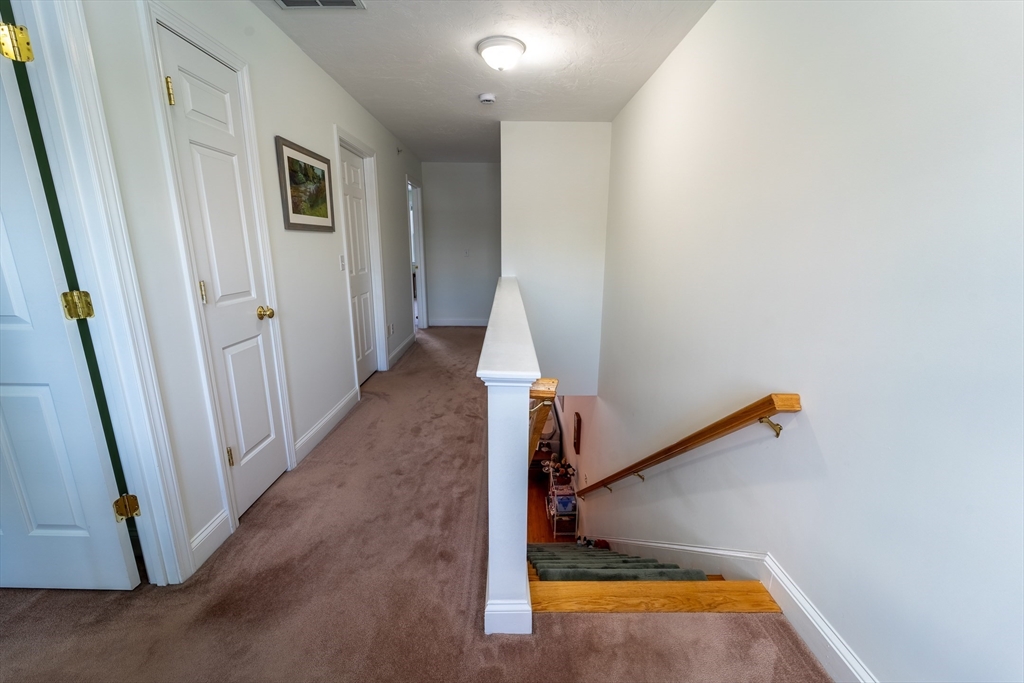 17 Village Way, Unit 17 Rutland, MA 01543 - Photo 25 of 33 an entryway in a hall with a window
