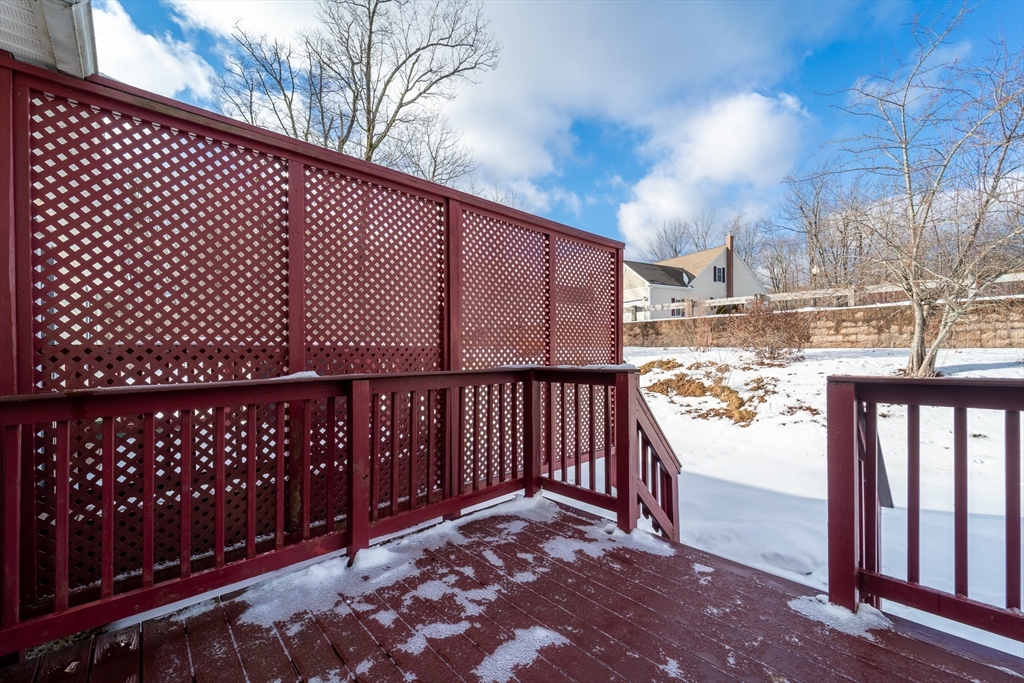 17 Village Way, Unit 17 Rutland, MA 01543 - Photo 28 of 33 a view of a balcony with wooden fence