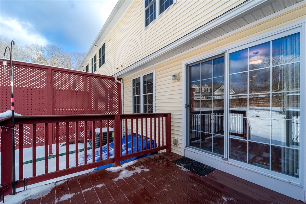 17 Village Way, Unit 17 Rutland, MA 01543 - Photo 29 of 33 a view of a roof deck with wooden floor and fence