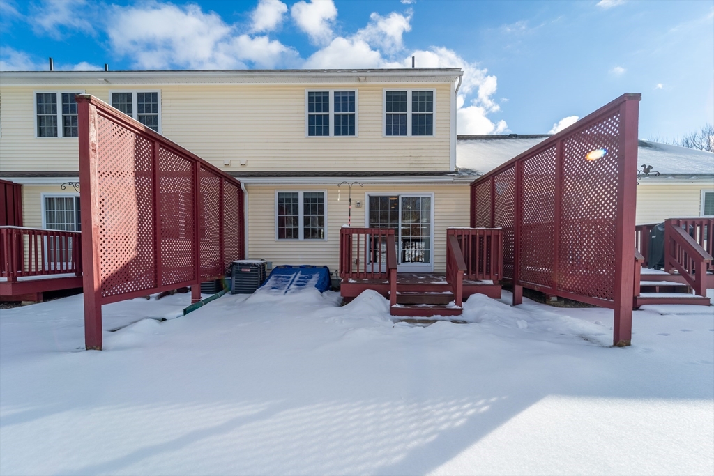 17 Village Way, Unit 17 Rutland, MA 01543 - Photo 30 of 33 a view of a house with patio outdoor dining space and furniture