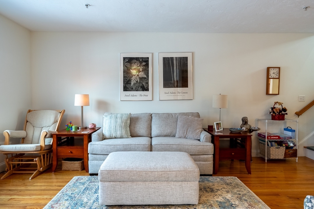 17 Village Way, Unit 17 Rutland, MA 01543 - Photo 4 of 33 a living room with furniture and wooden floor