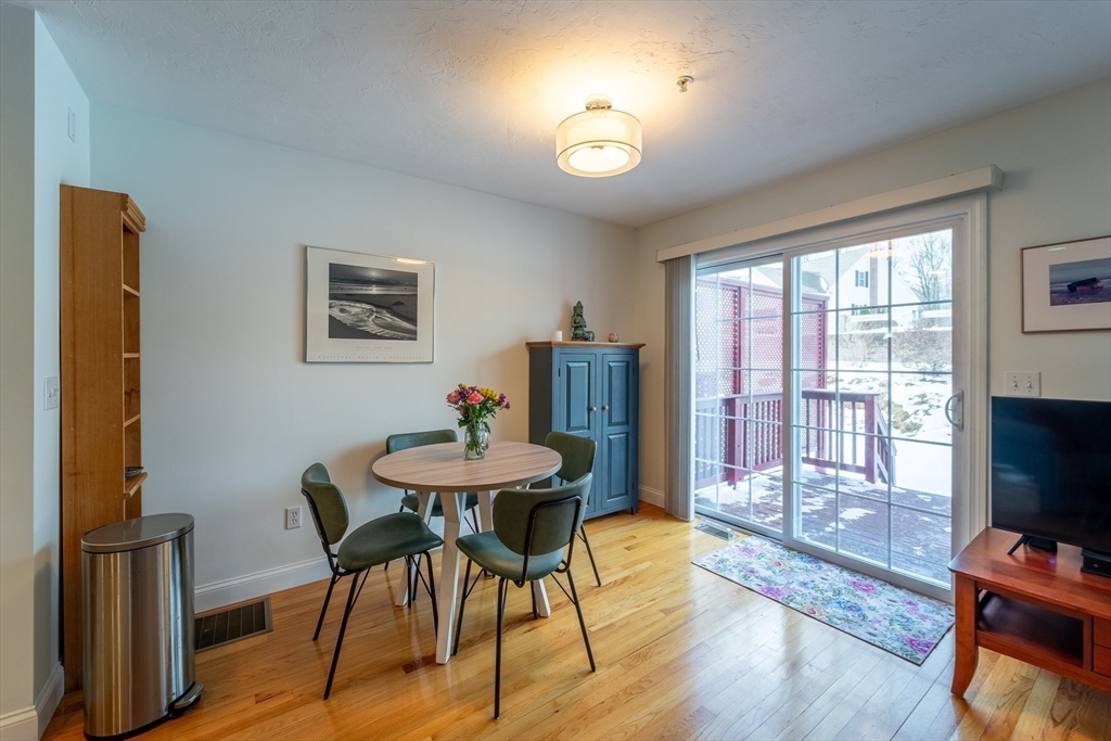 17 Village Way, Unit 17 Rutland, MA 01543 - Photo 7 of 33 a view of a dining room with furniture window and wooden floor