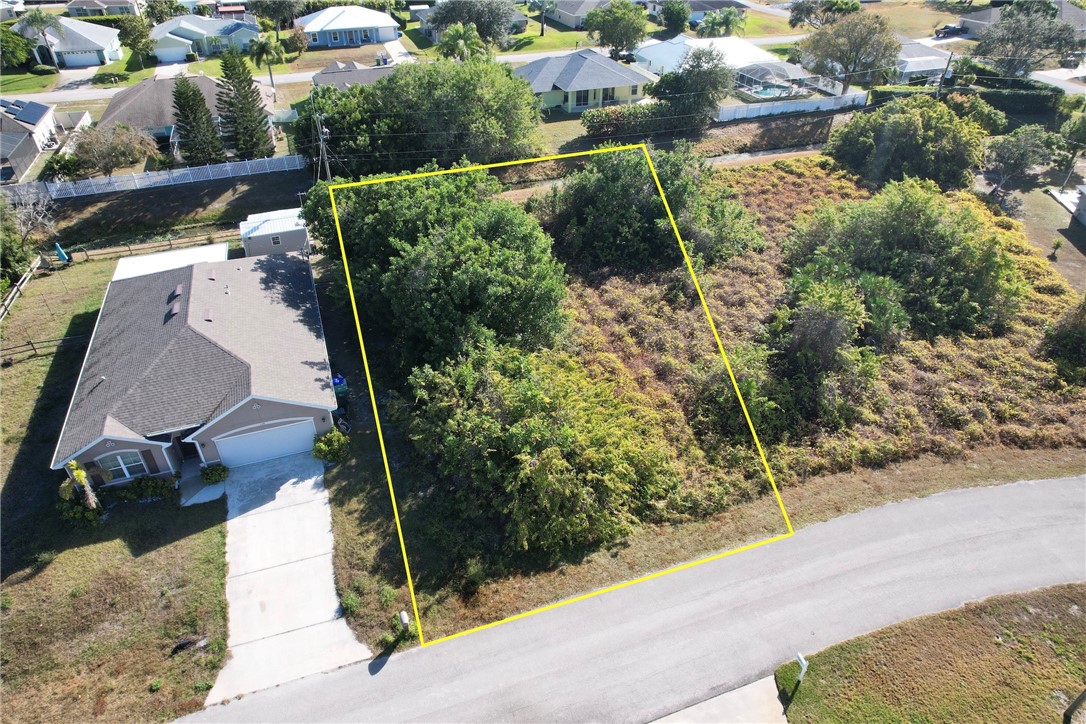 106 Tracy Drive Sebastian, FL 32958 - Photo 2 of 35 an aerial view of residential houses with outdoor space